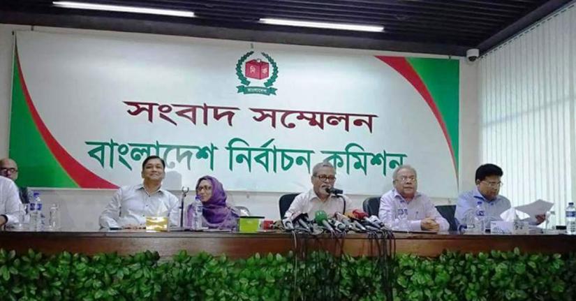 Chief Election Commissioner KM Nurul Huda, flanked by other Election Commission officials, addresses a press briefing at the commission office in Dhaka’s Agargaon. Courtesy