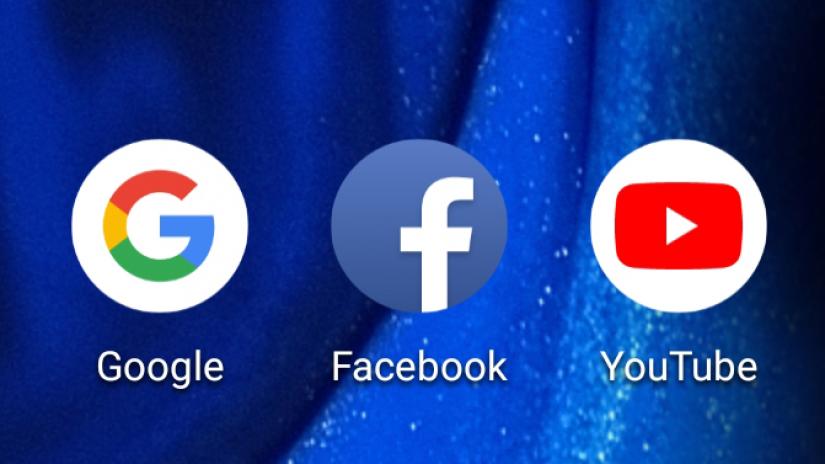 Photo shows logos of Google, Facebook, and YouTube on a mobile screen. BANGLA TRIBUNE