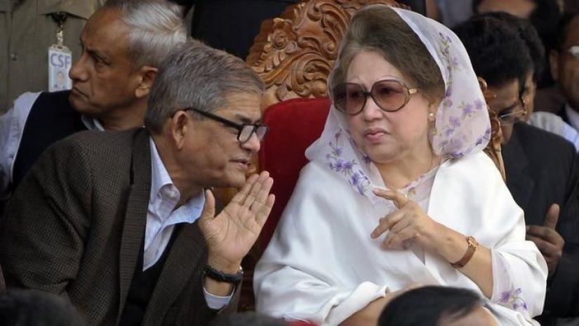 This undated photo shows BNP chief Khaleda Zia speaking with Secretary General Mirza Fakhrul Islam Alamgir during at a programme.
