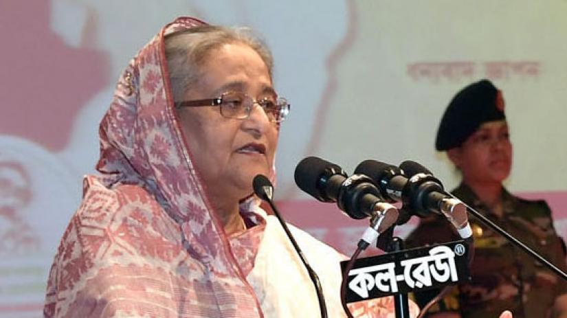 Prime Minister Sheikh Hasina speaks at a seminar titled” March 7 speech of Father of the Nation Bangabandhu Sheikh Mujibur Rahman: Political Poet and Immortal Poem” in Dhaka on Friday (Mar 8). PID/File Photo