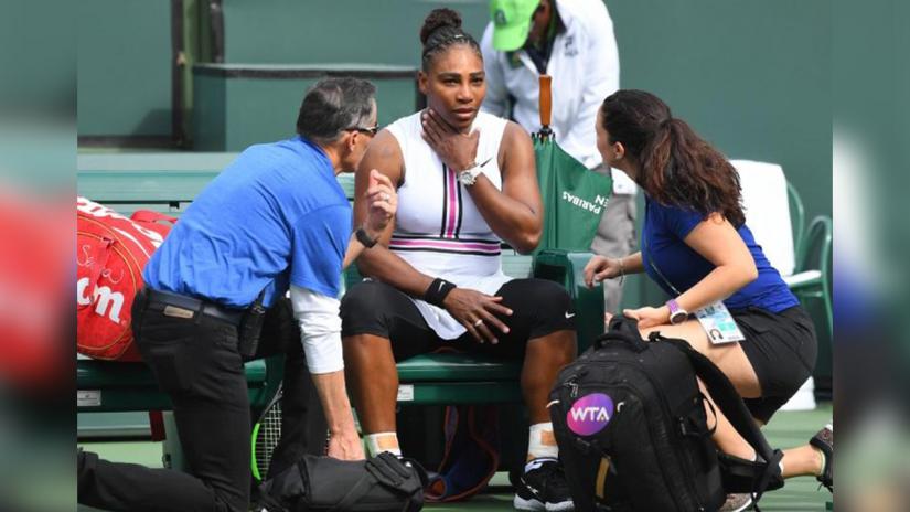 Serena Williams (USA) receives medical attention as she retired in the second set of her third round match against Garbine Muguruza (not pictured) due do a viral illness in the BNP Paribas Open at the Indian Wells Tennis Garden on Mar 10, 2019; Indian Wells, CA, USA. USA TODAY Sports