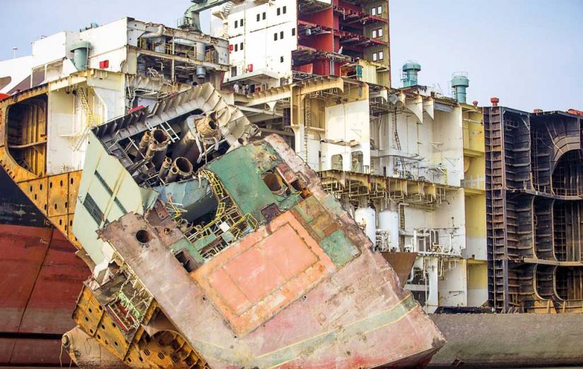 Partially broken down ship in a shipbreaking yard in Chattogram. Bigstock