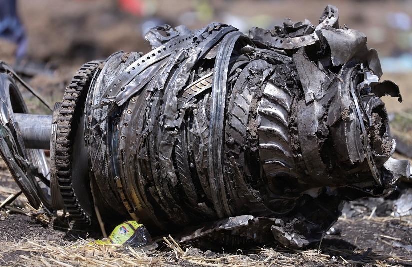 Airplane engine parts are seen at the scene of the Ethiopian Airlines Flight ET 302 plane crash, near the town of Bishoftu, southeast of Addis Ababa, Ethiopia March 11, 2019. REUTERS