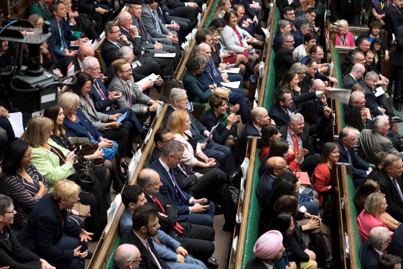MPs react in Parliament following the vote on Brexit in London, Britain, March 13, 2019. UK Parliament/Jessica Taylor/Handout via REUTERS