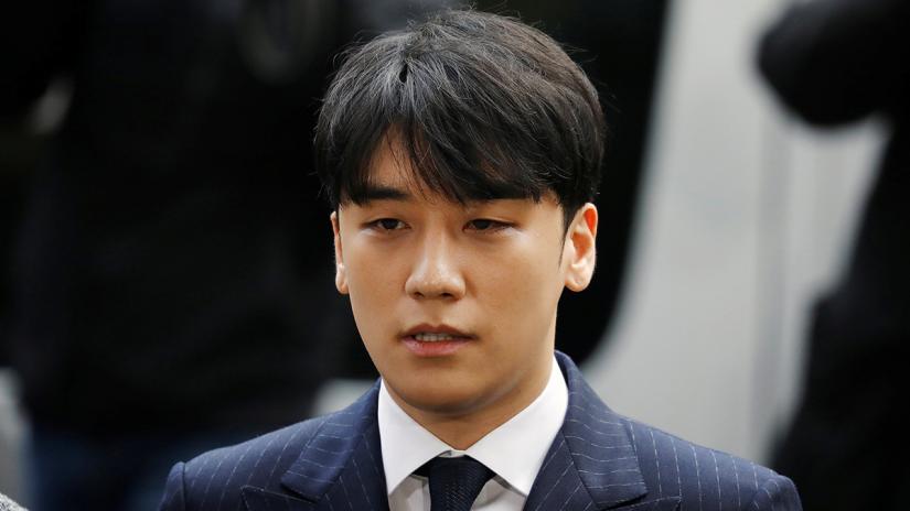 Seungri, a member of South Korean K-pop band Big Bang, arrives to be questioned over a sex bribery case at the Seoul Metropolitan Police Agency in Seoul, South Korea, March 14, 2019. REUTERS