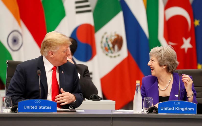 US President Donald Trump and Britain`s Prime Minister Theresa May attend the G20 leaders summit in Buenos Aires, Argentina November 30, 2018. REUTERS