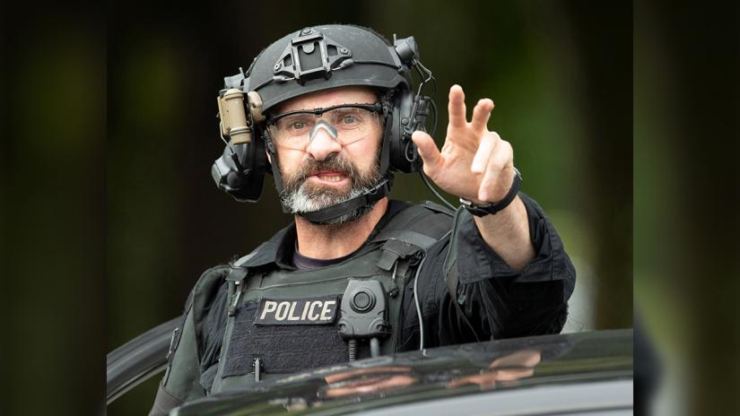 AOS (Armed Offenders Squad) member following a shooting at the Al Noor mosque in Christchurch, New Zealand, March 15, 2019. REUTERS
