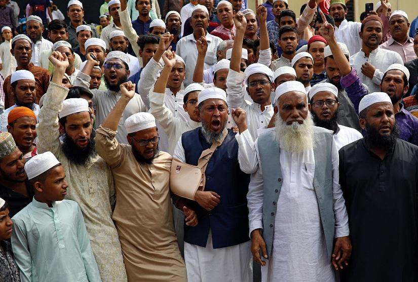 Muslims shout slogans as they condemn the Christchurch mosque attack in New Zealand, after Friday prayers at the Baitul Mukarram National Mosque in Dhaka, Bangladesh, March 15, 2019. REUTERS