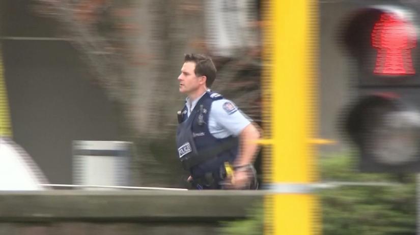 A police officer is seen after reports that several shots had been fired at a mosque, in central Christchurch, New Zealand March 15, 2019, in this still image taken from video. TVNZ/via REUTERS