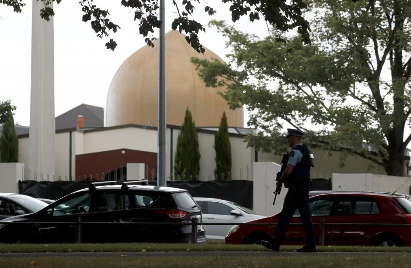 A policeman patrols outside Masjid Al Noor mosque after Friday`s mosque attacks in Christchurch, New Zealand, March 16, 2019. REUTERS