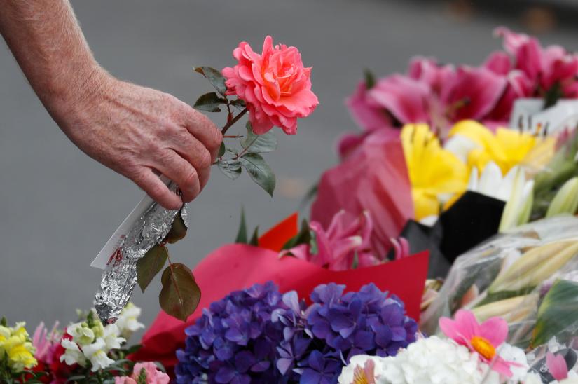 A flower is placed outside Masjid Al Noor mosque in memory of the victims of the mosque shootings in Christchurch, New Zealand, March 17, 2019. REUTERS