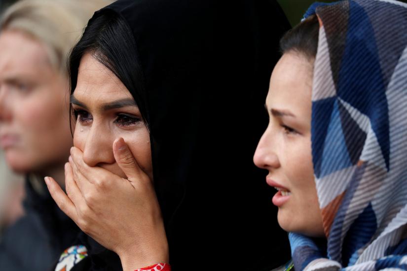 Women react near Masjid Al Noor mosque in Christchurch, New Zealand, March 17, 2019. REUTERS