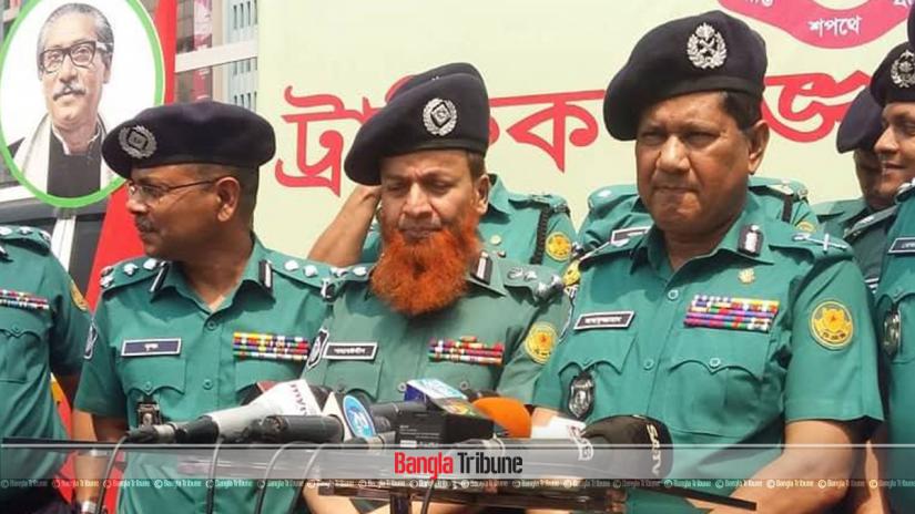 Dhaka Metropolitan Police Commissioner Asaduzzaman Mian  speaks to the media while inaugurating traffic week  in Dhaka Sunday (Mar 17).