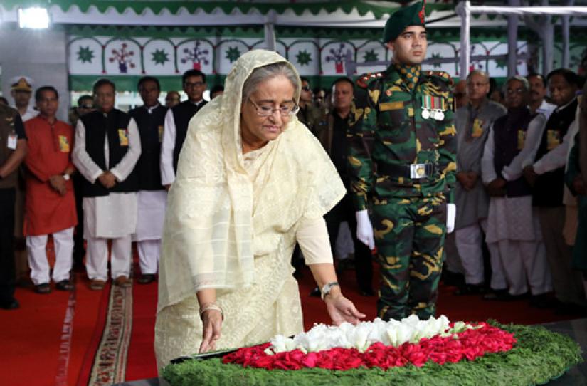 Prime Minister Sheikh Hasina paid homage by placing a wreath at the portrait of Bangabandhu in front of Bangabandhu Memorial Museum at the historic 32 Dhanmondi Road on Sunday (Mar 17) morning.