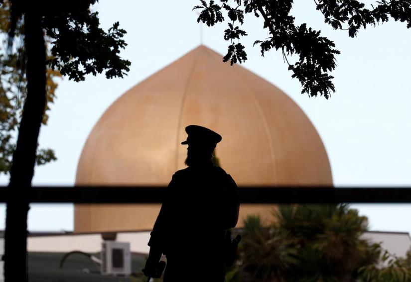 A police officer is pictured outside Masjid Al Noor mosque in Christchurch, New Zealand, March 17, 2019. REUTERS