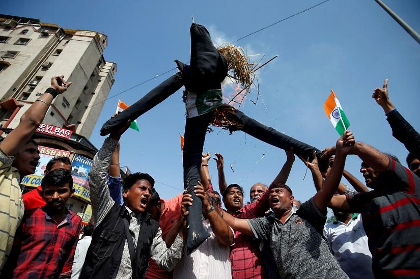 People burn an effigy depicting Pakistan as they celebrate after Indian authorities said their jets conducted airstrikes on militant camps in Pakistani territory, in Ahmedabad, India, February 26, 2019. REUTERS/File Photo