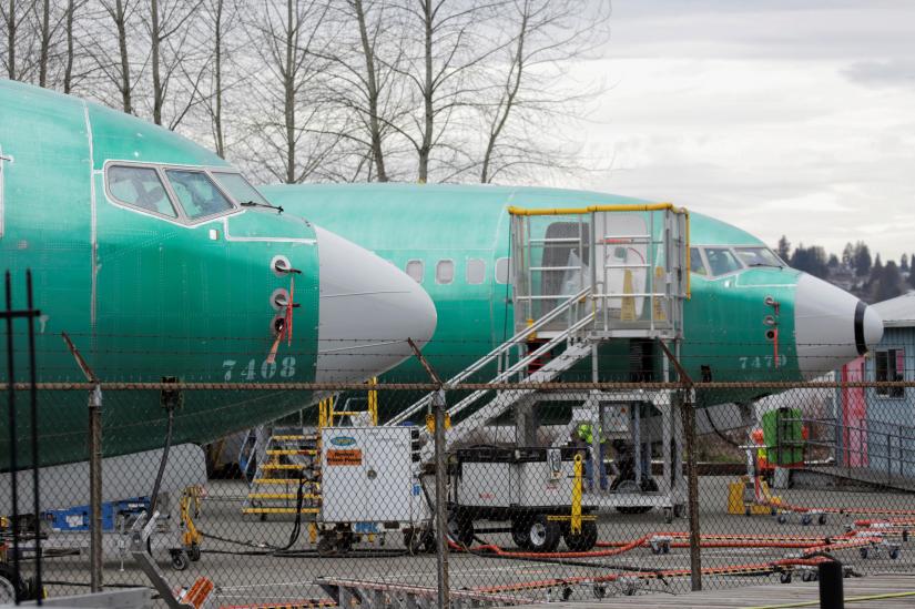 Two Boeing 737 MAX 8 aircraft are parked at a Boeing production facility in Renton, Washington, U.S., March 11, 2019. REUTERS