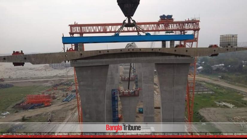 The first roadway slab was placed on the Zajira end of Padma Bridge on Tuesday (Mar 19).