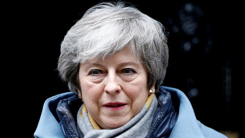 British Prime Minister Theresa May walks outside Downing Street, as she faces a vote on Brexit, in London, Britain March 13, 2019. REUTERS/File Photo