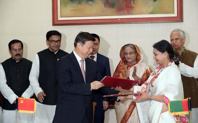 Bangladesh Awami League and Communist Party of China signed an MoU to boost cooperation in Dhaka on Thursday, Mar 20, 2019 in presence of Bangladesh Prime Minister Sheikh Hasina at her official residence. PID/handout photo