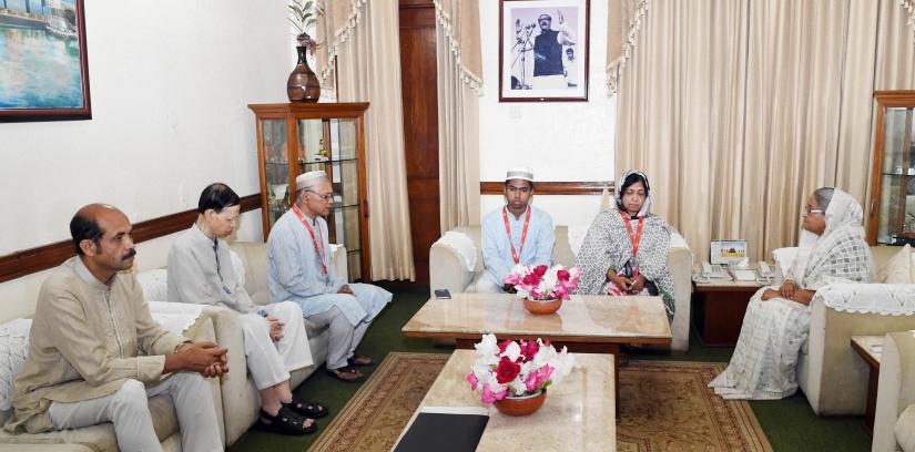  Family of Abrar Ahmed Chowdhury, who was killed in a road accident in city, meets Prime Minister Sheikh Hasina at Ganabhaban on Friday (Mar 22). PID