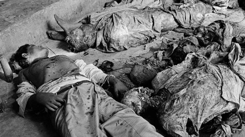 Bodies of the Bengali intellectuals taken away on the 14th December 1971 by Al-Badr fanatical group, which had just been discovered and identified, including 7 professors of the Dacca University. Another 10 bodies were still awaiting identification most of them were garotted. Photo: Marilyn Silverstone/ Magnum Photos