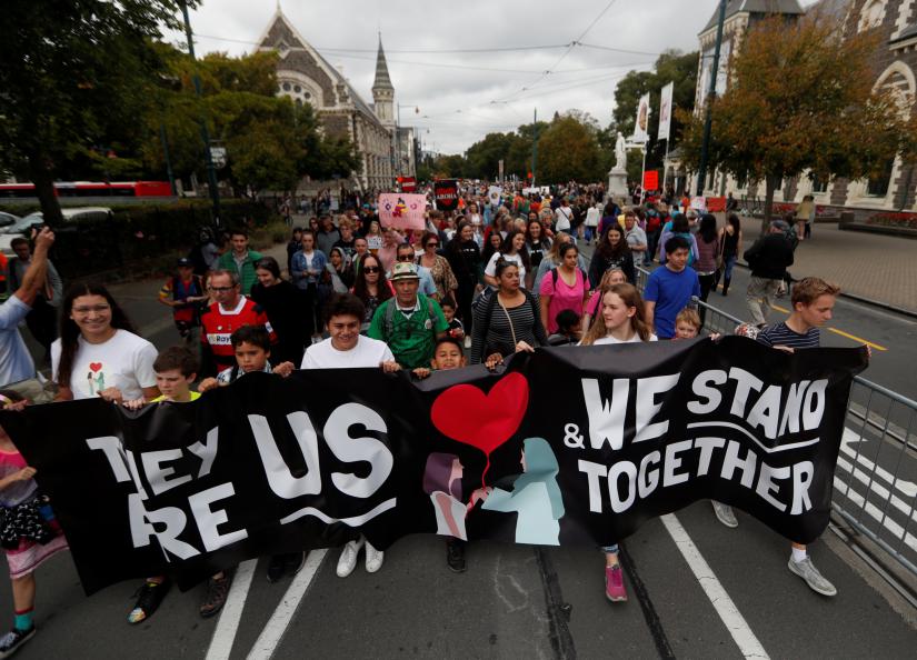 People take part in the `March for Love` at North Hagley Park after the last week`s mosque attacks in Christchurch, New Zealand March 23, 2019. REUTERS