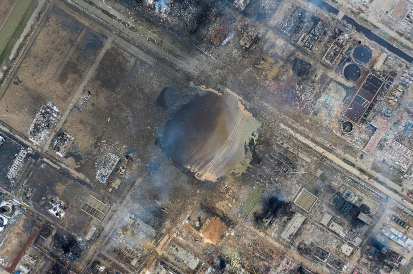 Damaged buildings are seen on the site following an explosion at a pesticide plant owned by Tianjiayi Chemical, in Xiangshui county, Yancheng, Jiangsu province, China March 22, 2019. Picture taken March 22, 2019. Caixin Media via REUTERS
