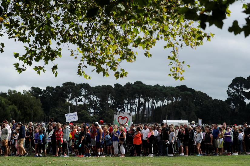 People take part in the `March for Love` at North Hagley Park after the last week`s mosque attacks in Christchurch, New Zealand March 23, 2019. REUTERS