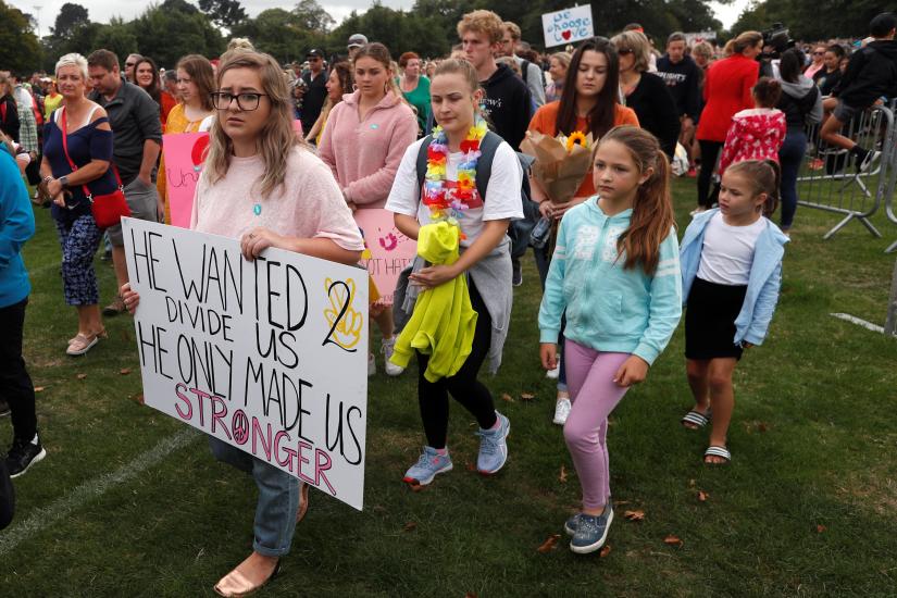 People take part in the `March for Love` at North Hagley Park after last week`s mosque attacks in Christchurch, New Zealand, March 23, 2019. REUTERS