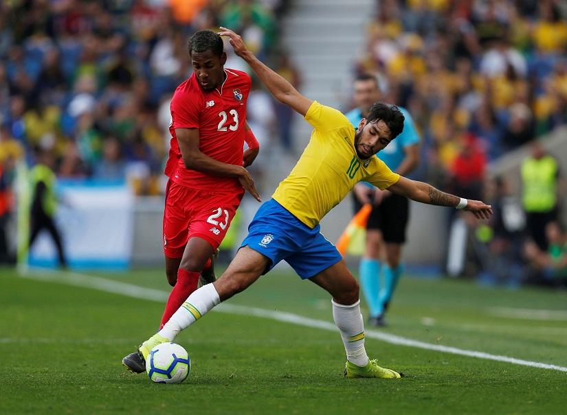 Brazil`s Lucas Paqueta in action with Panama`s Michael Murillo at Estadio do Dragao, Porto, Portugal on Mar 23, 2019. REUTERS