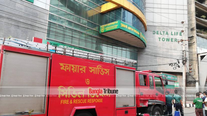 Firefighting vehicle is seen in front of `Delta Life Tower` at the capital`s Gulshan-2 in Dhaka after fire services receive reports of a fire on the building’s fifth floor on Mar 30, 2019.