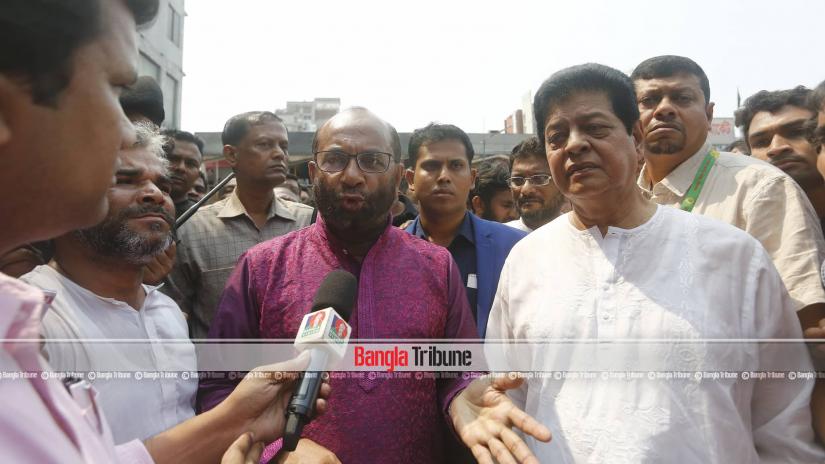 Housing and Public Works Minister SM Rezaul Karim speaks to the media on Saturday (Mar 30) after visiting the Gulshan-1 DNCC kitchen market where fire burnt down nearly 300 shops. PHOTO/Nashirul Islam
