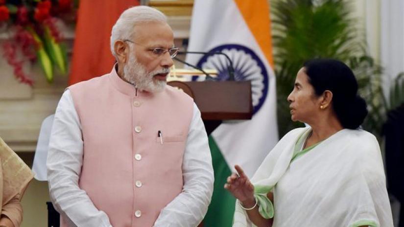 The undated photo shows India`s Prime Minister Narendra Modi and West Bengal CM Mamata Banerjee in New Delhi. PTI/File Photo