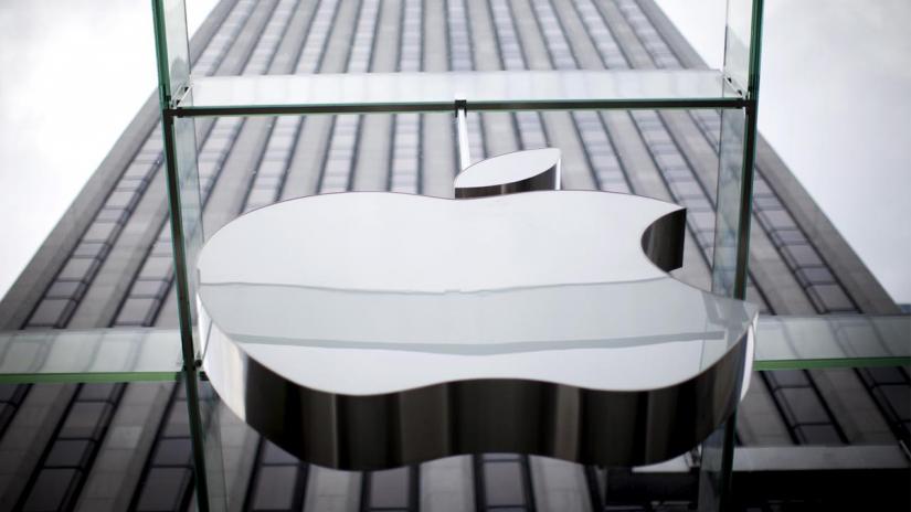 An Apple logo hangs above the entrance to the Apple store on 5th Avenue in the Manhattan borough of New York City, July 21, 2015. REUTERS/File Photo