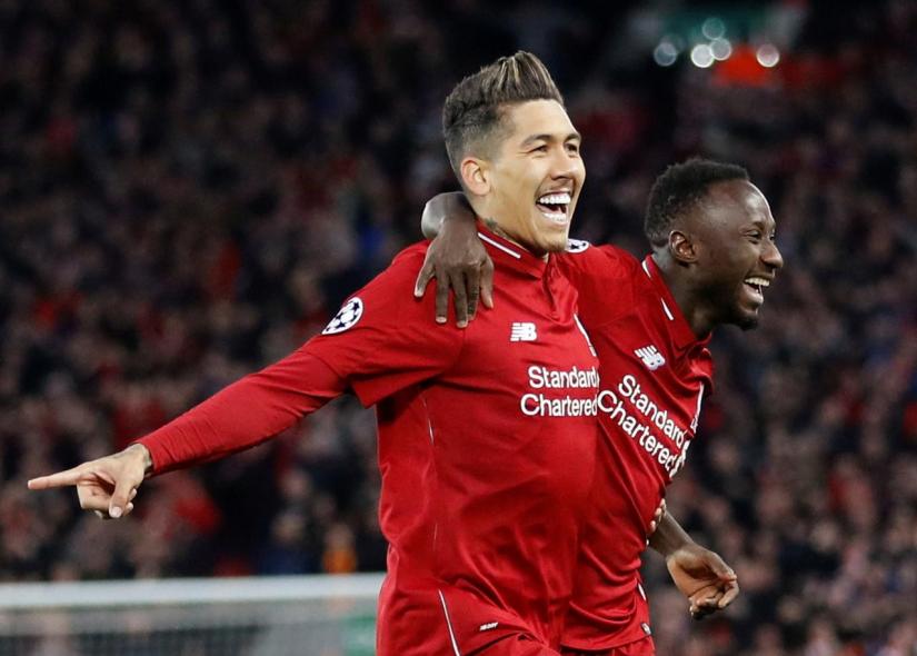 Liverpool`s Naby Keita celebrates scoring their first goal with Roberto Firmino in Champions League Quarter Final First Leg against FC Porto at Anfield, Liverpool, Britain on Apr 9, 2019. Reuters