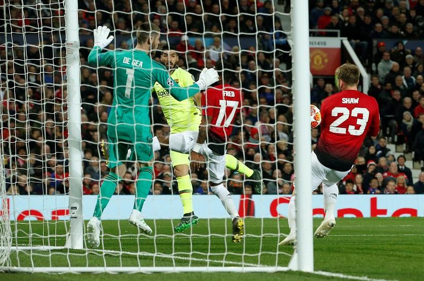 Barcelona`s Luis Suarez scores their first goal against Manchester United at Old Trafford, Manchester, Britain on Apr 10, 2019. REUTERS