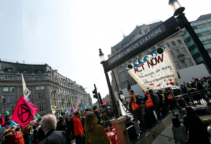 Climate change activists demonstrate at Oxford Circus during an Extinction Rebellion protest in London