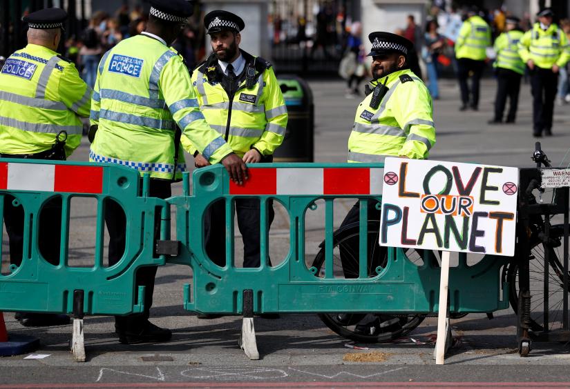 Police officers are seen during an Extinction Rebellion protest in London, Britain 