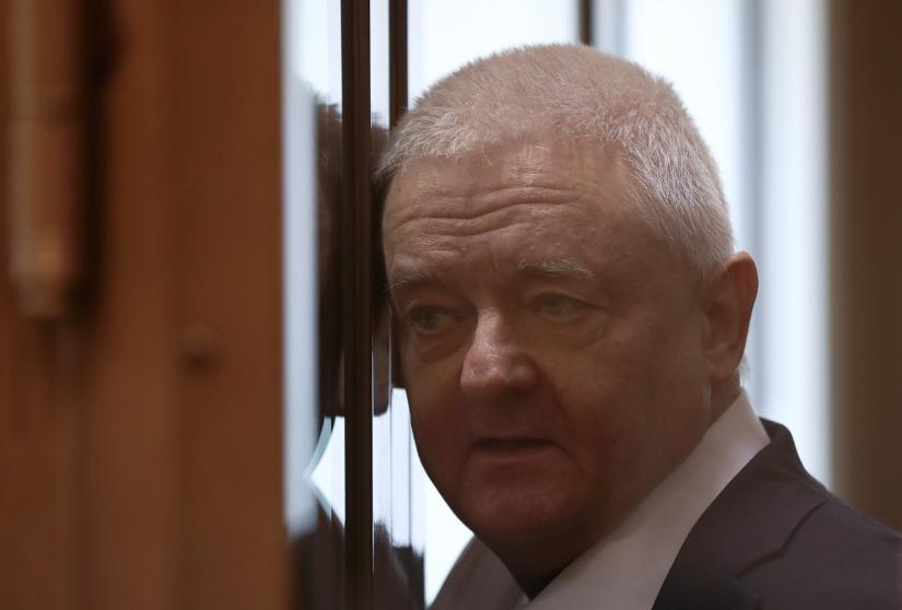 Frode Berg, a Norwegian national jailed by Russian authorities for espionage, stands inside a defendants` cage as he attends a court hearing in Moscow, Russia April 16, 2019. REUTERS