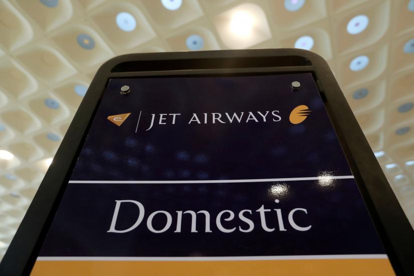 FILE PHOTO: A Jet Airways signage is seen at a check-in counter at the Chhatrapati Shivaji International airport in Mumbai, India, February 14, 2018. REUTERS