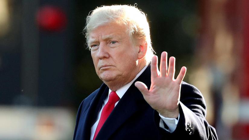 US President Donald Trump waves prior to departing on a trip to Wisconsin from the White House in Washington, US, Oct 24, 2018. REUTERS/File Photo
