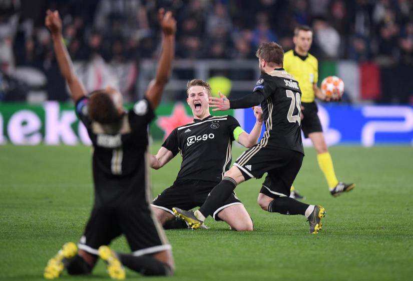 Ajax`s Matthijs de Ligt and Lasse Schone celebrate after the match against Juventus at Allianz Stadium, Turin, Italy on Apr 16, 2019. REUTERS