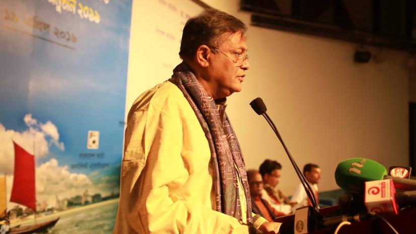 Information Minister Hasan Mahmud speaks at a photo exhibition in Dhaka on Friday (Apr 19). PHOTO/Sazzad Hossain