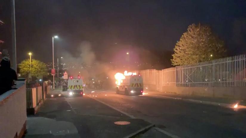 Rioters clash with emergency vehicles in Londonderry, Northern Ireland April 18, 2019, in this still image taken from a video from social media.