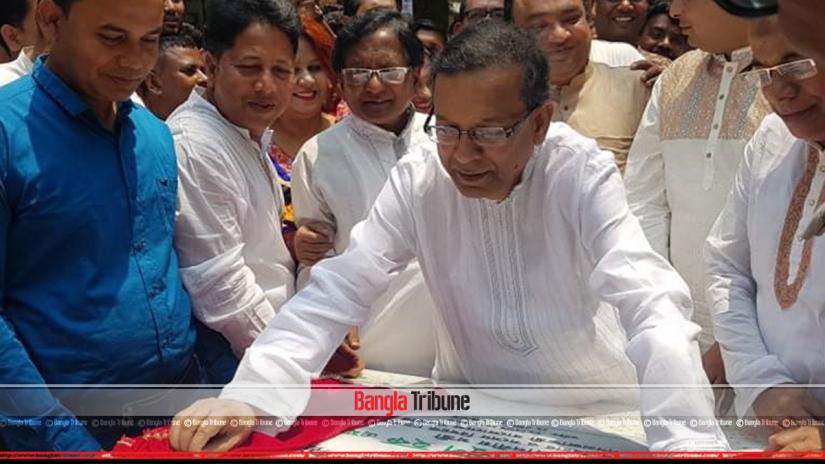 Law Minister Anisul Huq laying the foundation stone for a public health and engineering office at Brahmanbaria on Friday (Apr 19).
