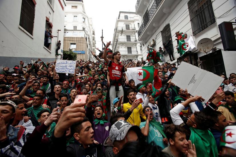 Protesters shout as hundreds of thousands of demonstrators return to the streets to press demands for wholesale democratic change well beyond former president Abdelaziz Bouteflika`s resignation, in Algeria