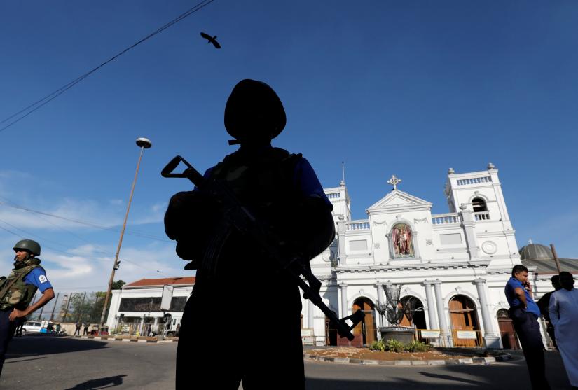 A security officer stands guard in front of St Anthony`s shrine in Colombo, after bomb blasts ripped through churches and luxury hotels on Easter, in Sri Lanka April 22, 2019. REUTERS
