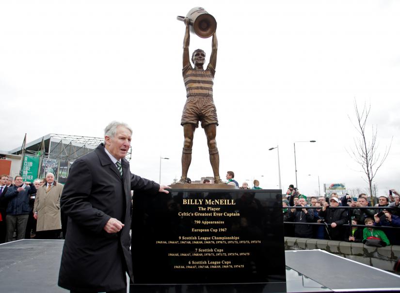 Former Celtic captain Billy McNeill beside a recently unveiled statue in his honour outside the ground before the game between Celtic and Motherwell at Ladbrokes Scottish Premiership - Celtic Park on Dec 19, 2015. Reuters/File Photo