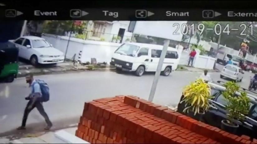 A suspected suicide bomber carries a backpack on a street in Negombo, Sri Lanka April 21, 2019 in this still image taken from a CCTV handout footage of Easter Sunday attacks released on April 23, 2019. CCTV/Siyatha News via REUTERS